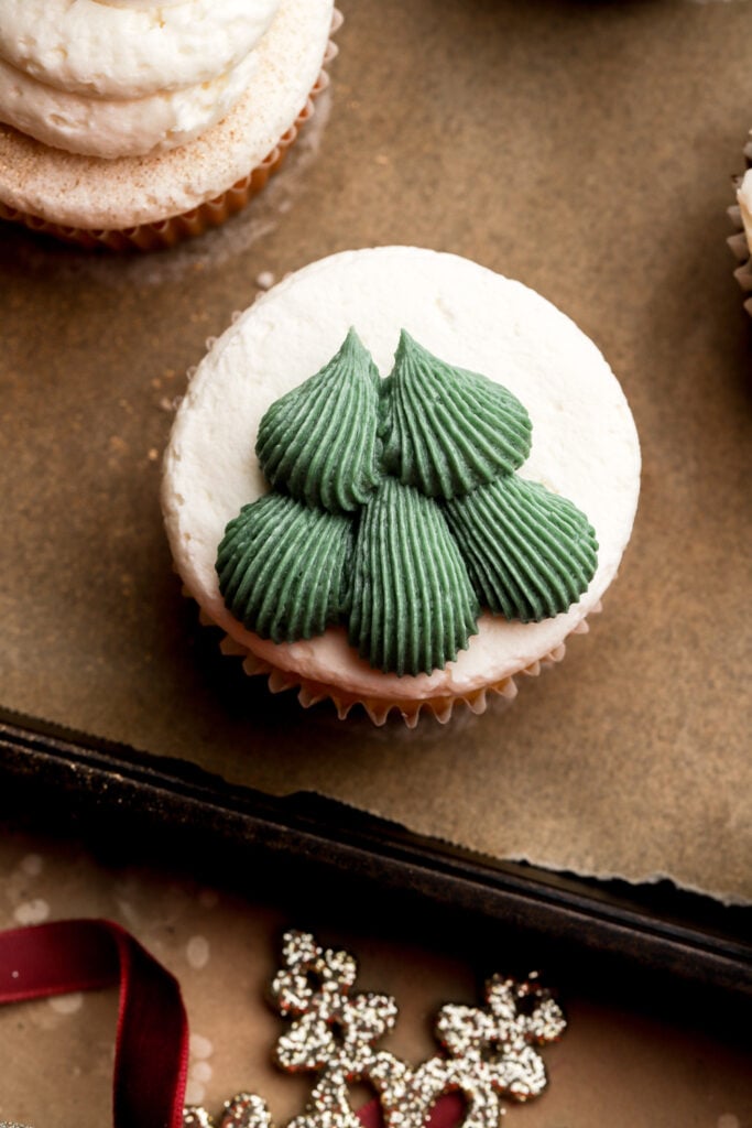next two poofs piped on top for the tree