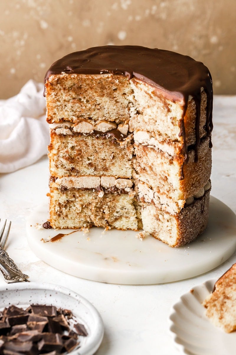 churro cake cut oven with chocolate drip on top