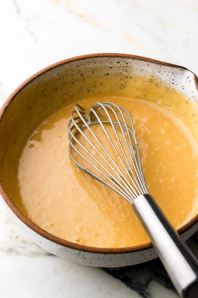 sour cream and vanilla whisked into batter