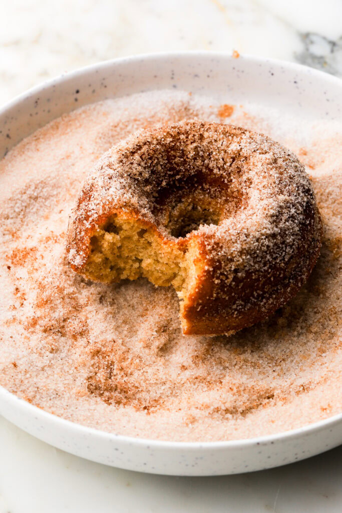 donuts rolled in cinnamon sugar
