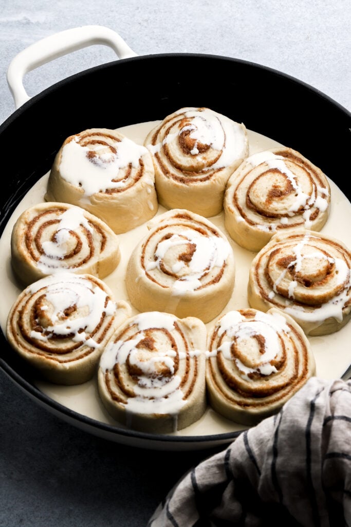 cinnamon rolls in heavy cream bath