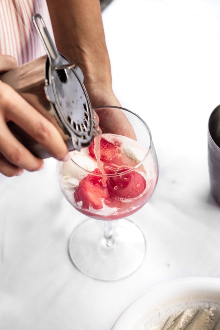cocktail pouring over homemade ice cream