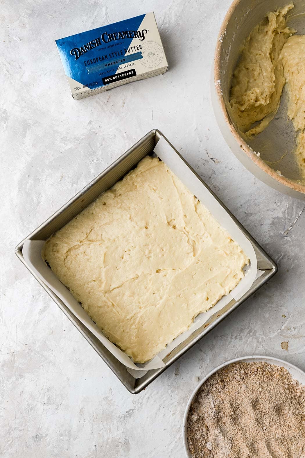 spread half of the batter into the prepared pan