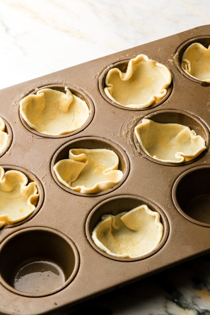 puff pastry dough in muffin tin