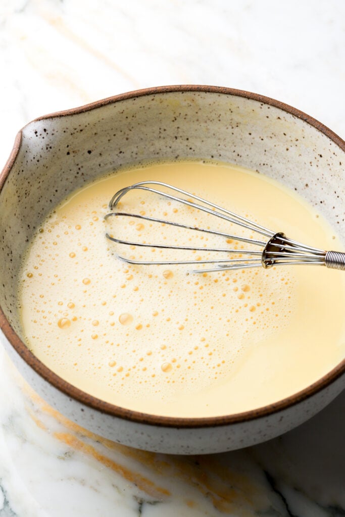 milk and vanilla added to eggs