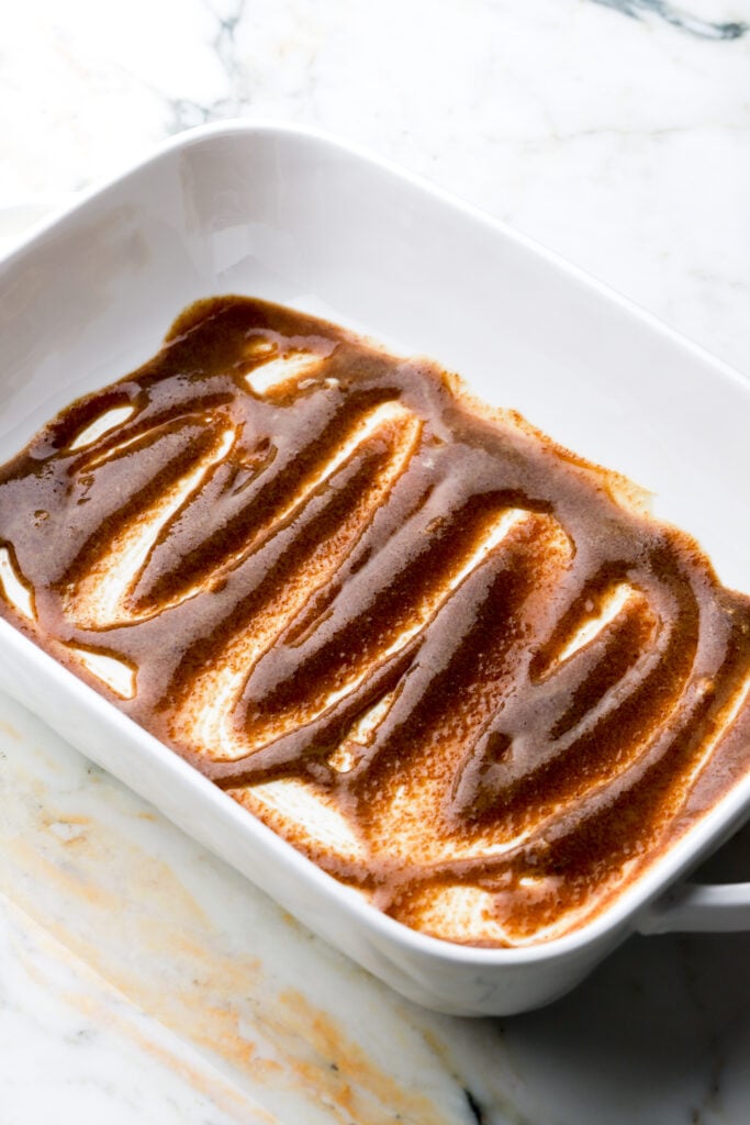 casserole dish with butter and brown sugar