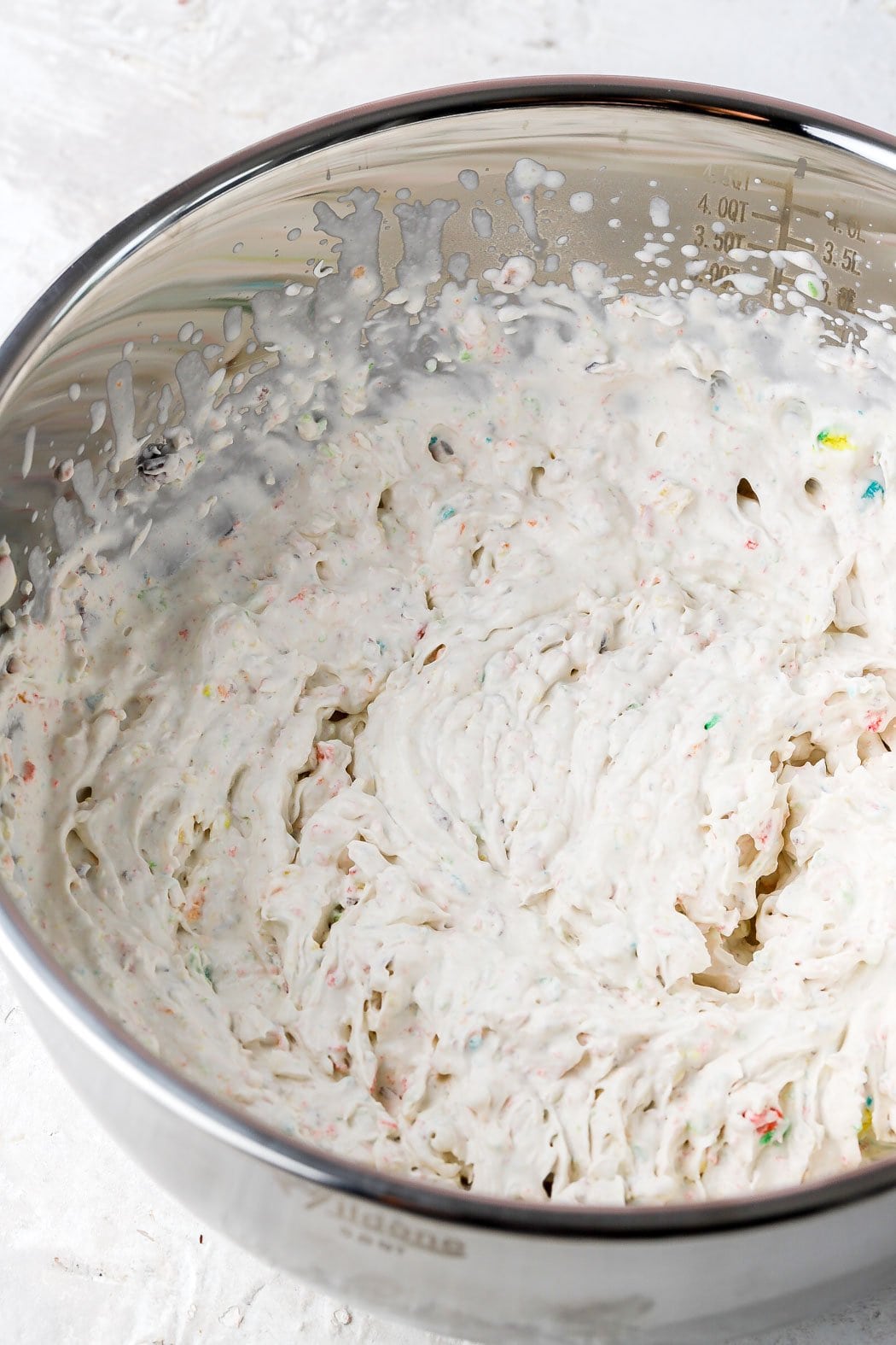 beat heavy whipping cream with fruity pebbles