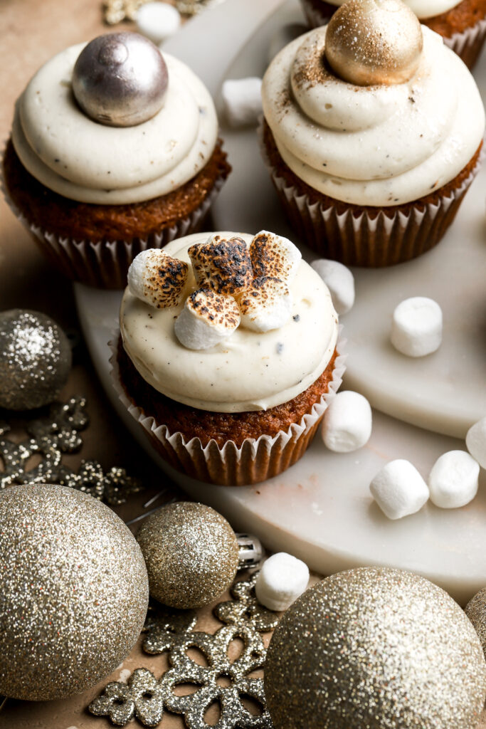 gingerbread cupcake topped with several mini marshmallows