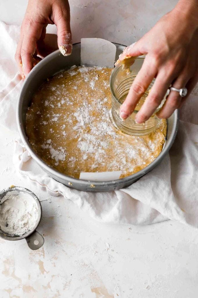 use a flat surface (cup) to smooth out batter