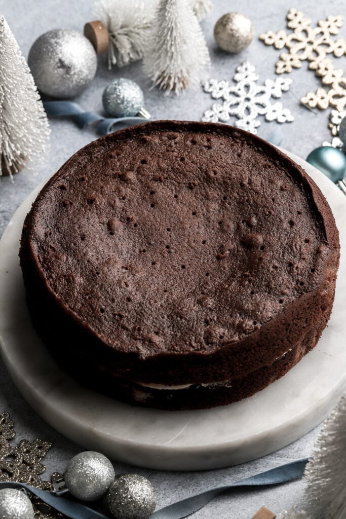 chocolate cake with holes poked on the top