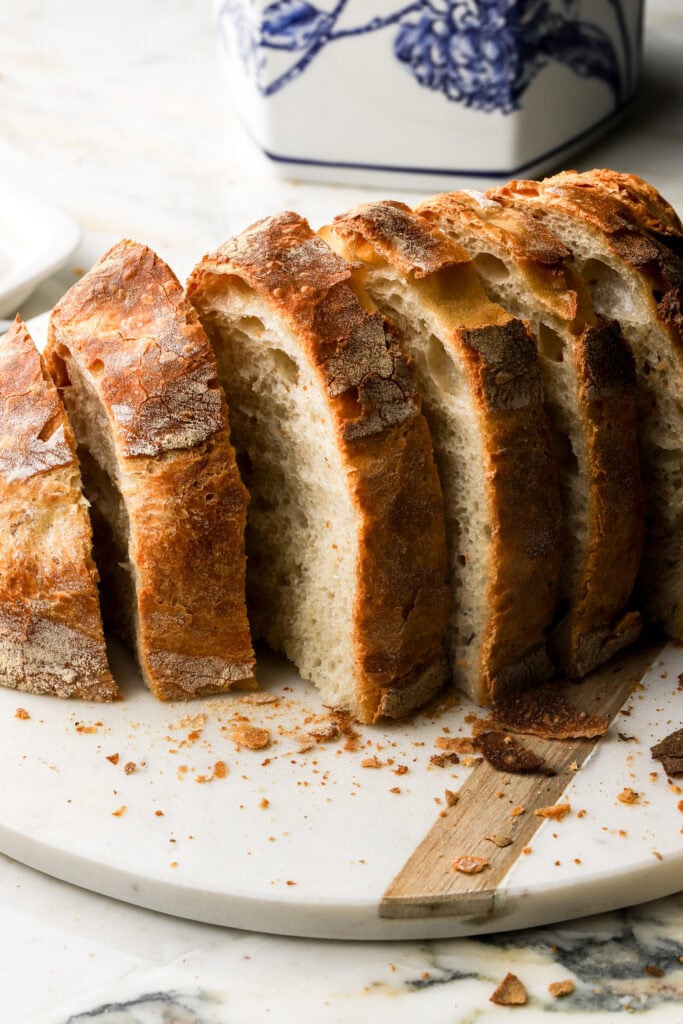 italian bread sliced on the board