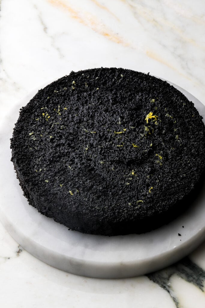lemon syrup spread on cake