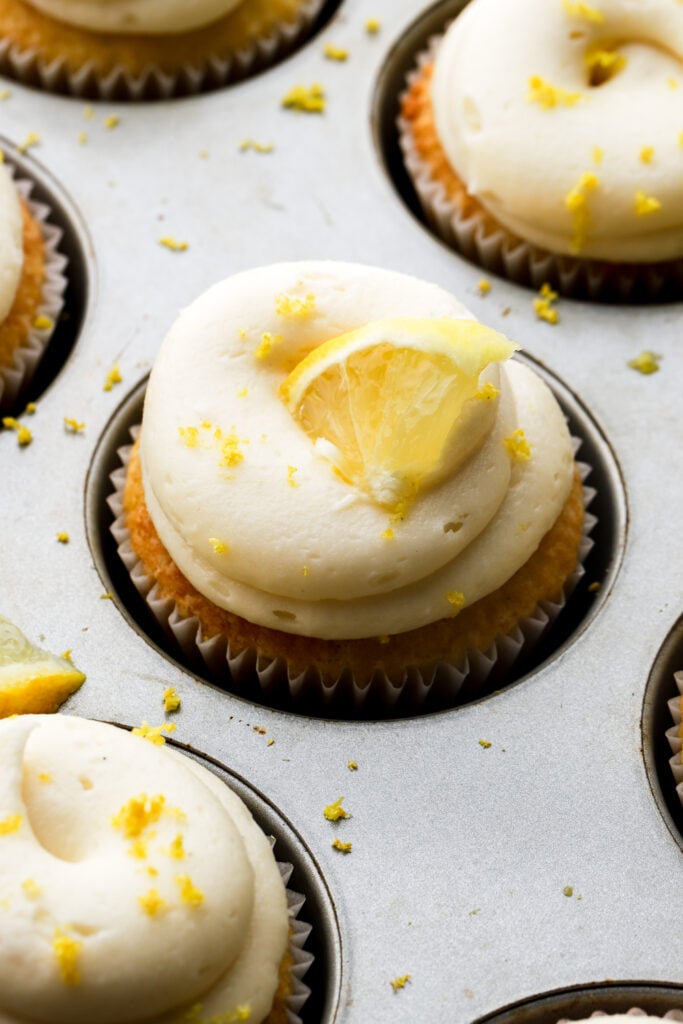 close up of a lemon cupcake with cream cheese frosting