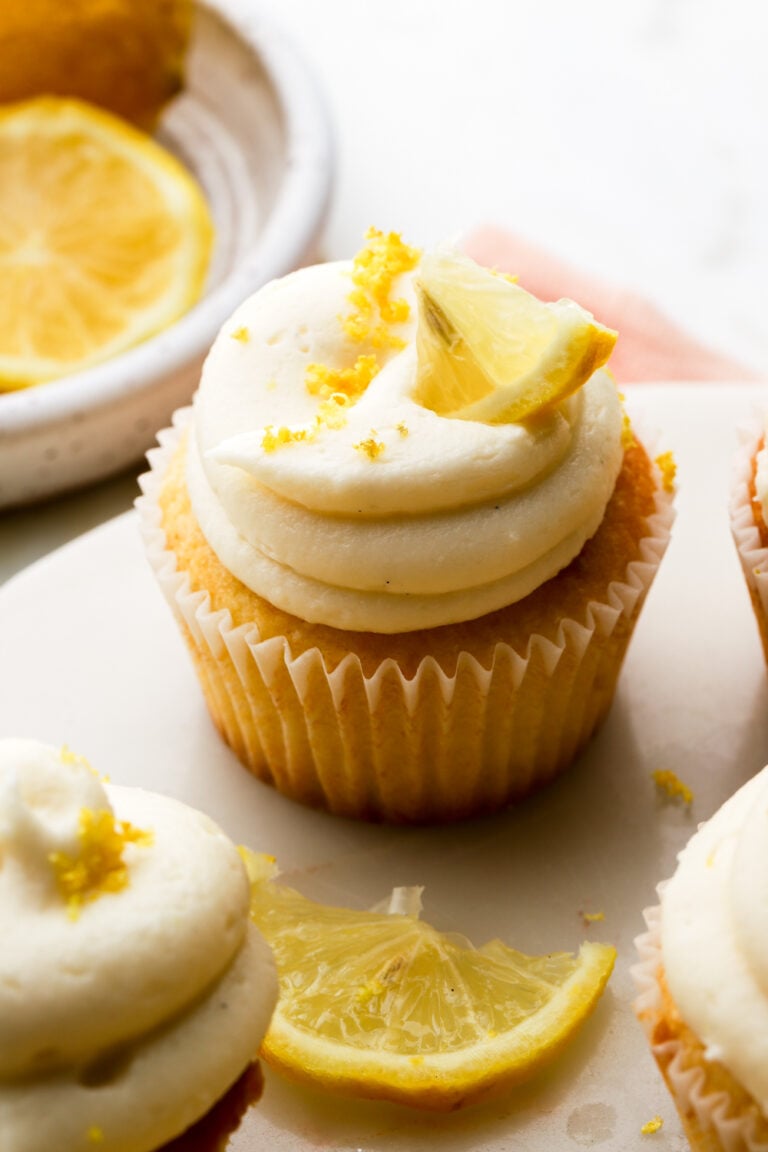 lemon cupcakes frosted with cream cheese frosting