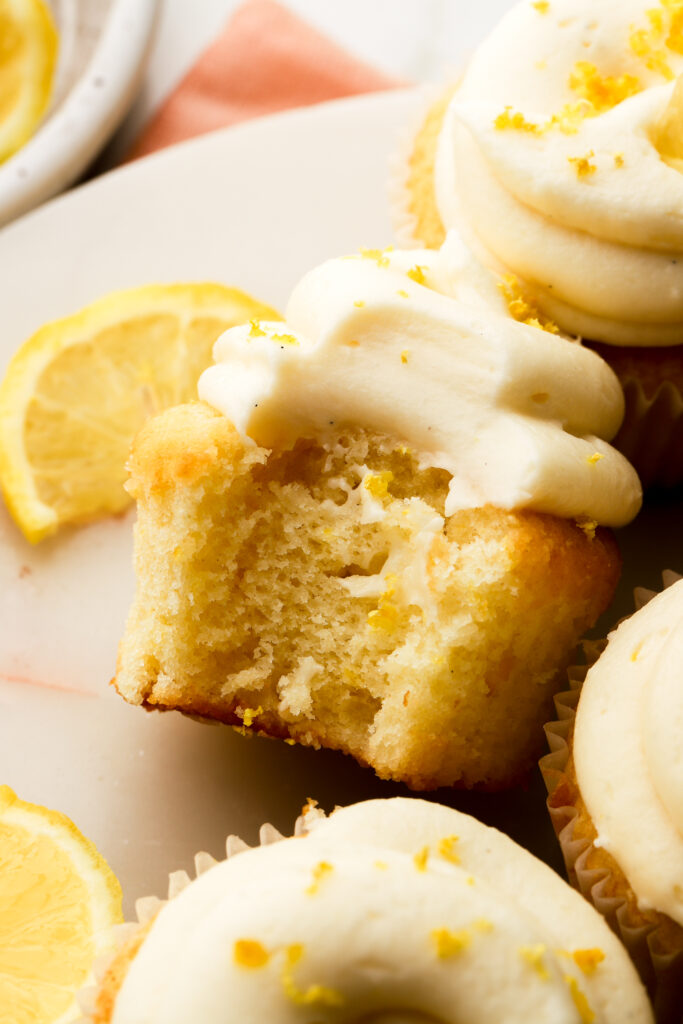 bite taken out of a lemon cupcake