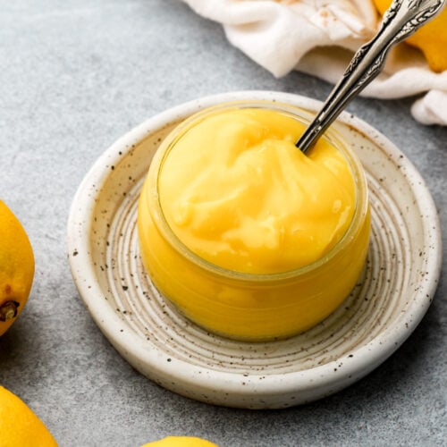 homemade lemon curd in a shallow jar