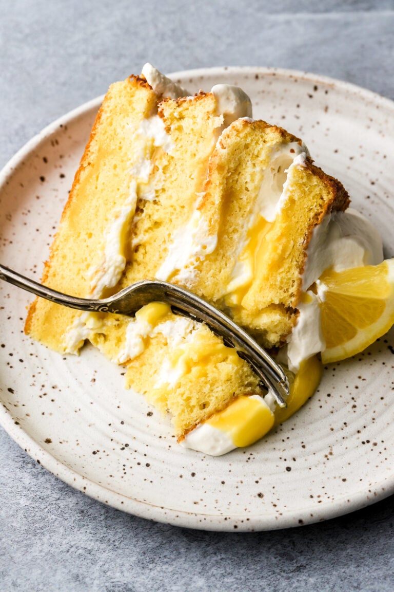 molly cake layered with whipped cream and lemon curd