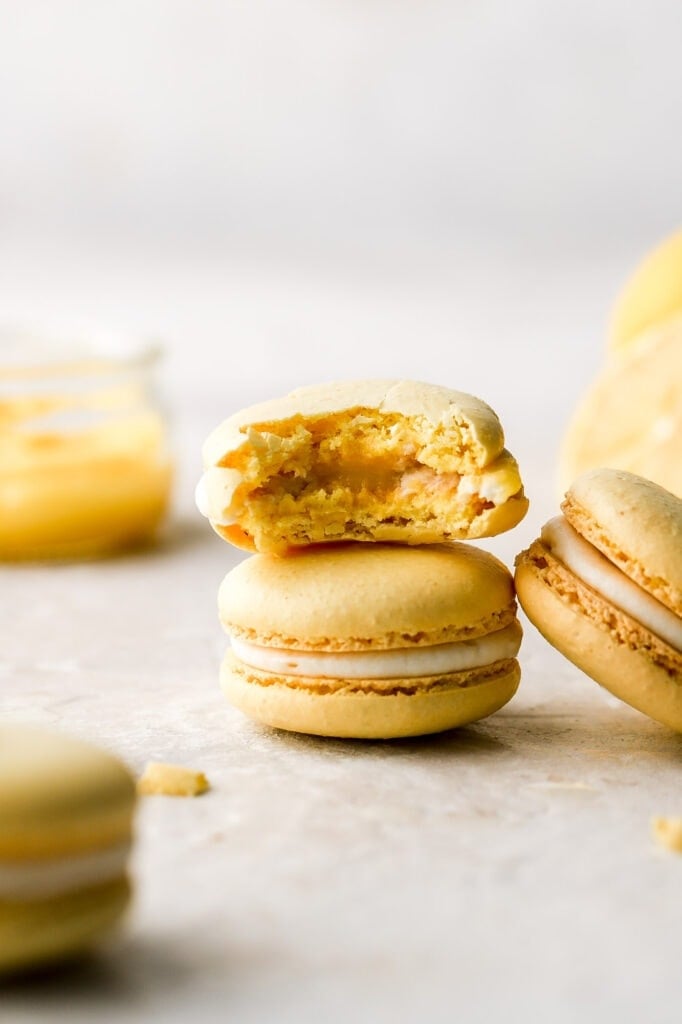 lemon macarons with cream cheese frosting and lemon curd