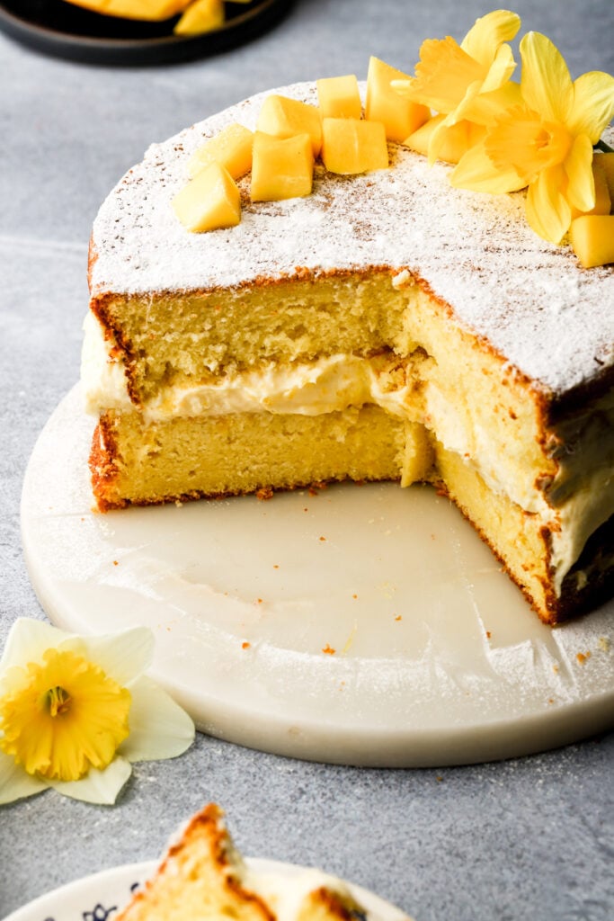 mango cake sliced into