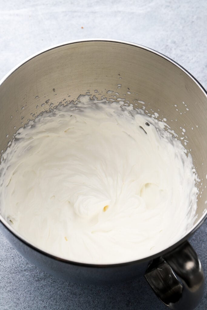 cream whipped to stiff peaks
