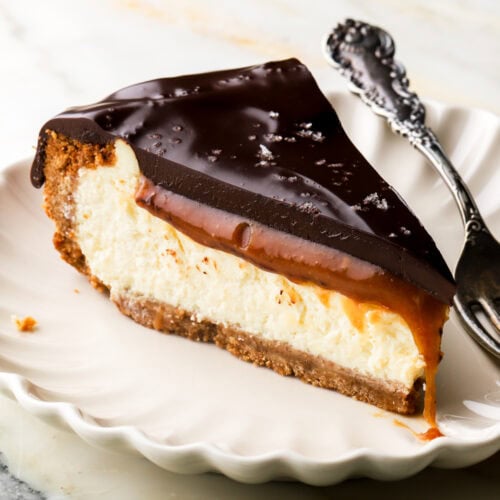 slice of millionaire cheesecake on a plate