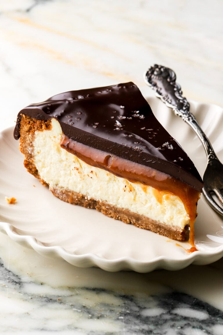 slice of millionaire cheesecake on a plate