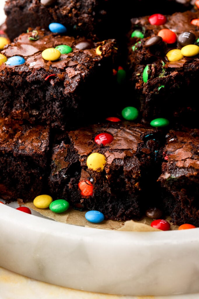 M&M Brownies stacked in a tray