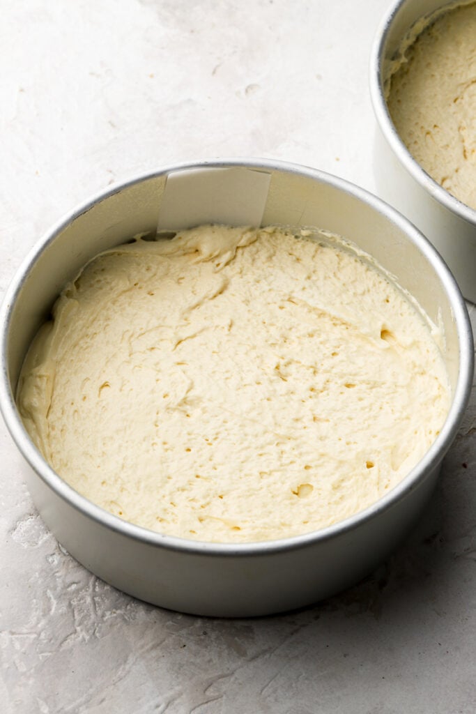 cake batter in 8 inch pans