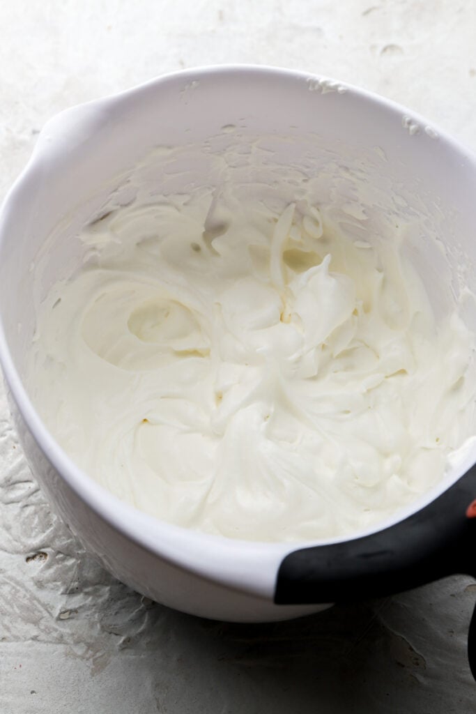 cream whipped to stiff peaks