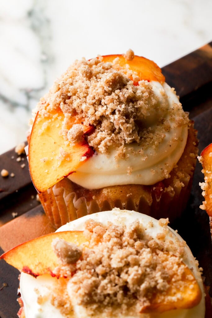close up of peach cobbler cupcakes