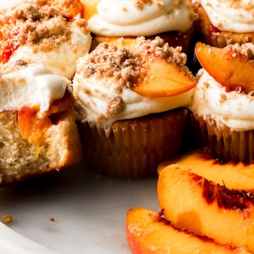 Peach cobbler cupcakes topped with streusel