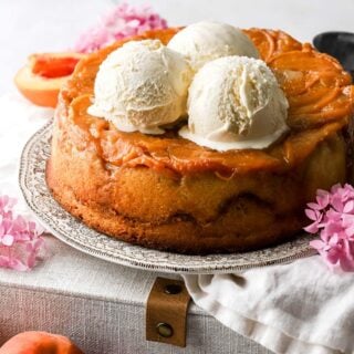 peach cobbler pound cake topped with ice cream