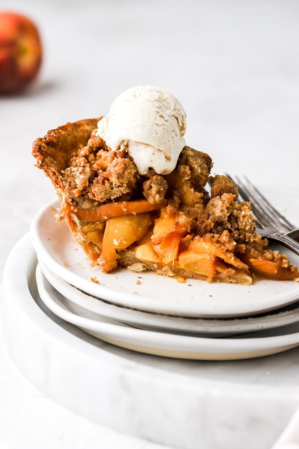 peach mango pie slice with ice cream
