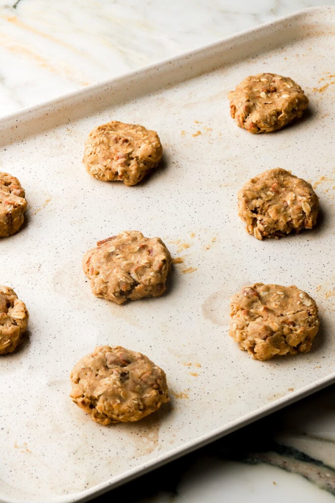 cookie dough on baking sheet - flattened