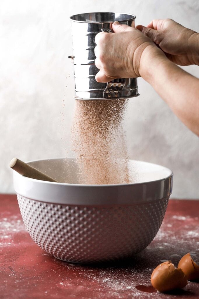 sift the dry ingredients over the wet