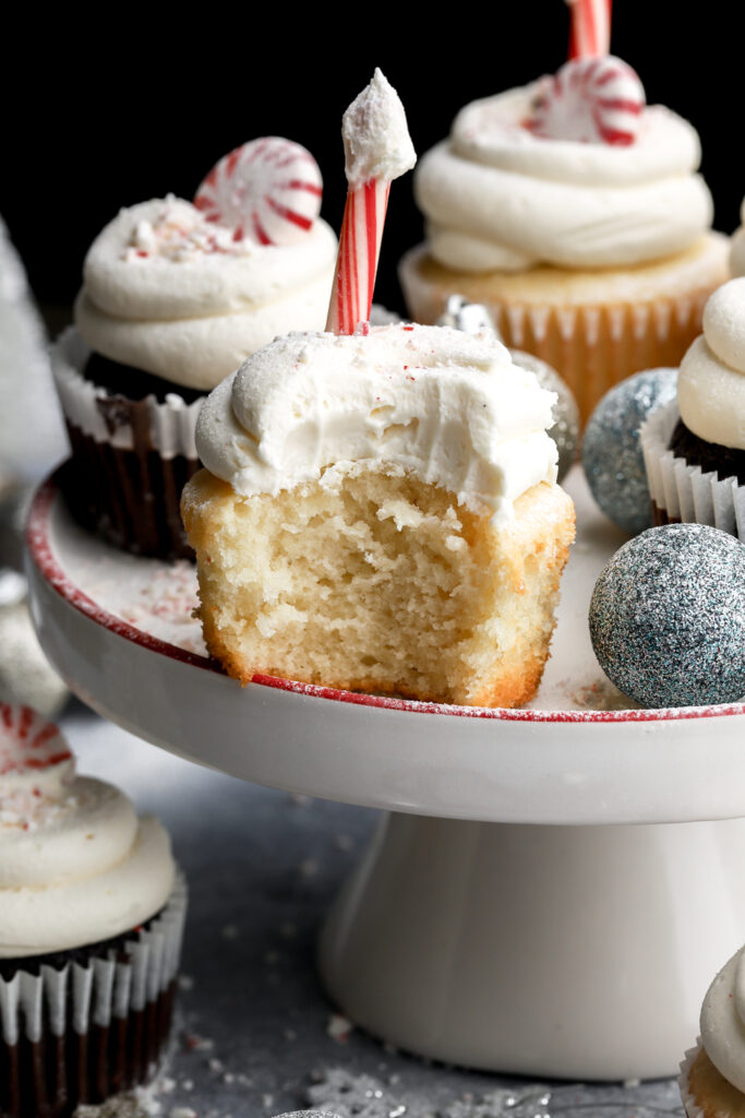 bite taken out of white chocolate peppermint cupcakes