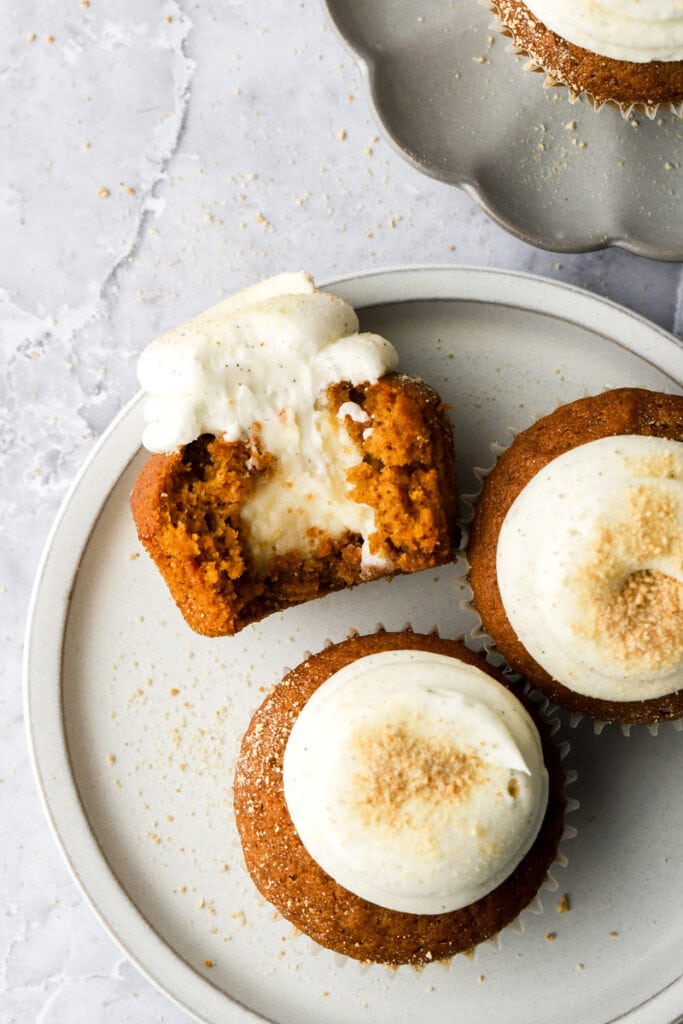 inside of cupcakes with cheesecake filling showing