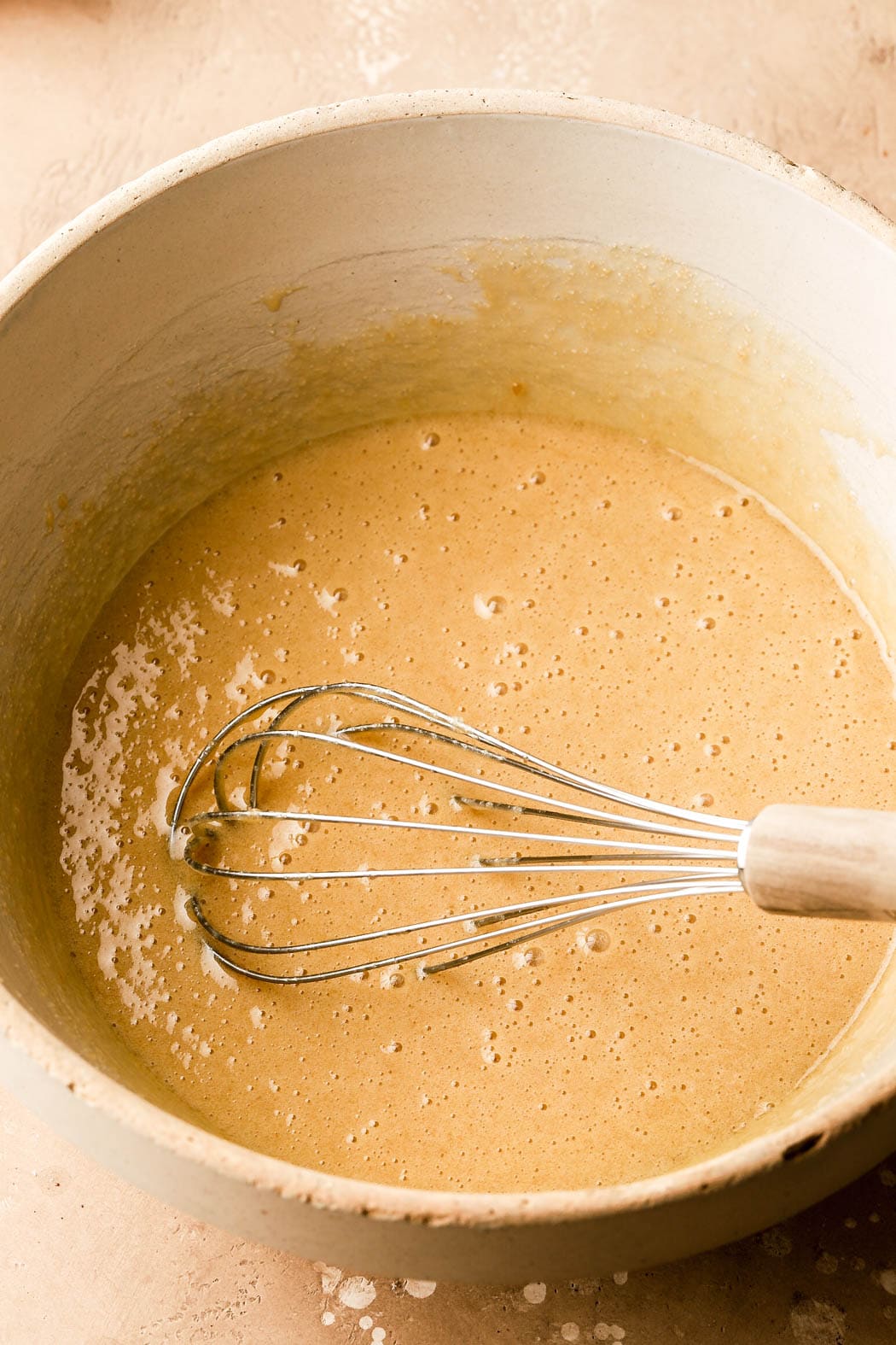 combine oil, sugar, eggs, and yogurt