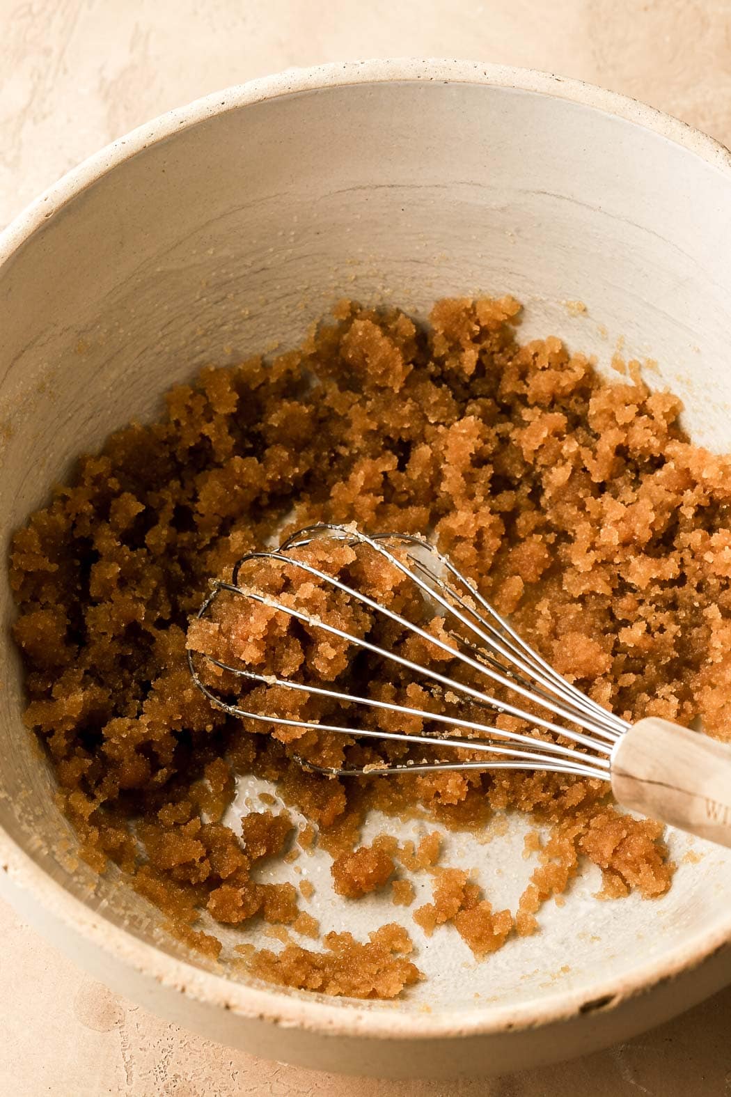 whisk together oil and sugars