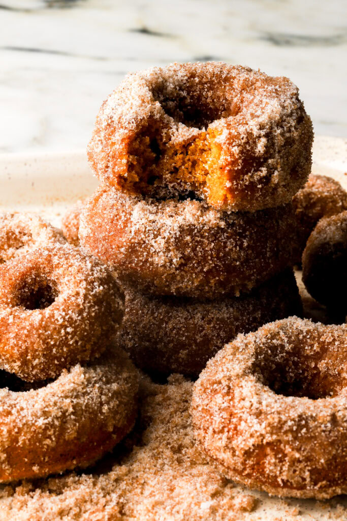 pumpkin spice donuts stacked 