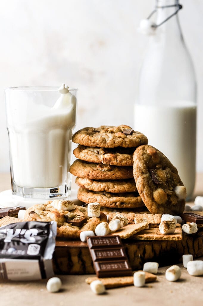 stack of cookies with splashing milk
