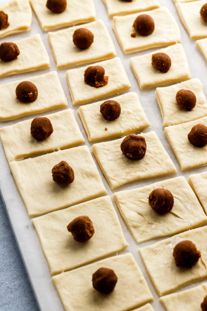 filling placed on squares of dough