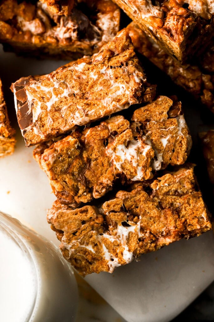 s'mores bars sliced with glass of milk