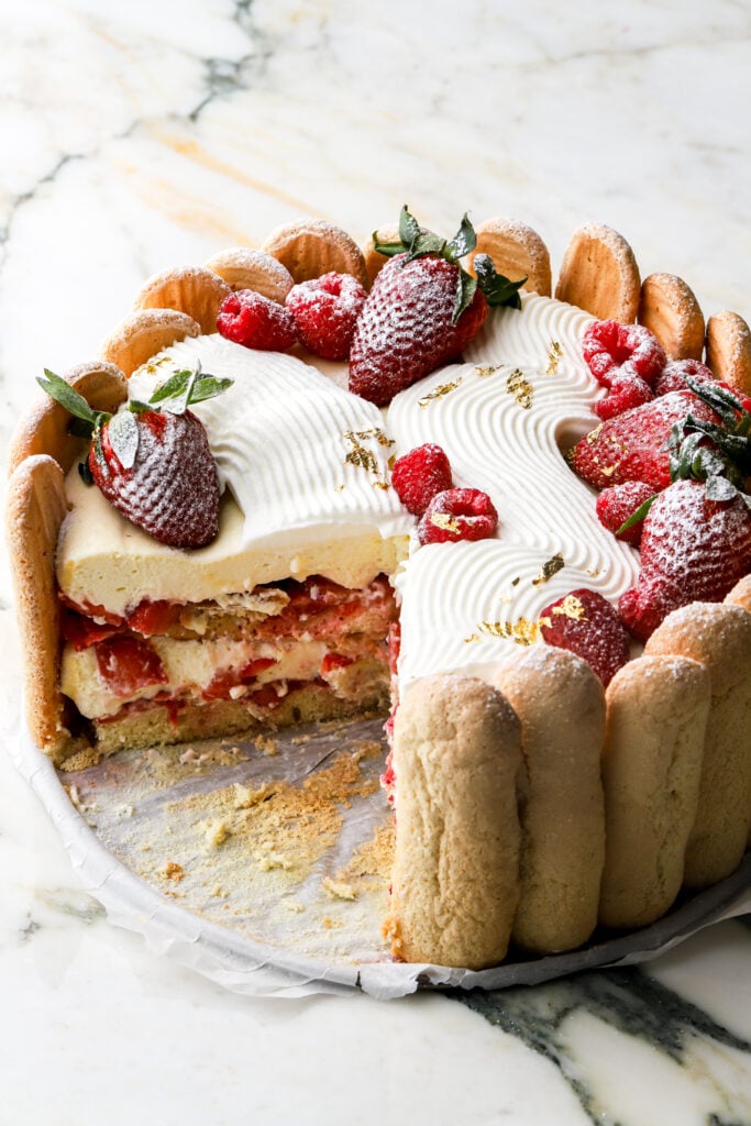 charlotte aux fraises with a slice missing