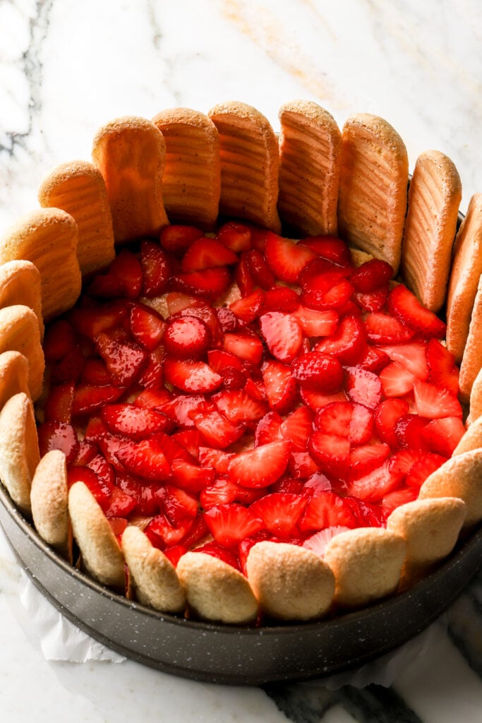 strawberries on top of the bottom layer