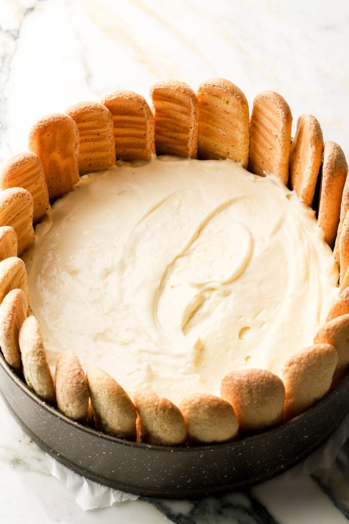 Bavarian cream spread on top of the strawberries.