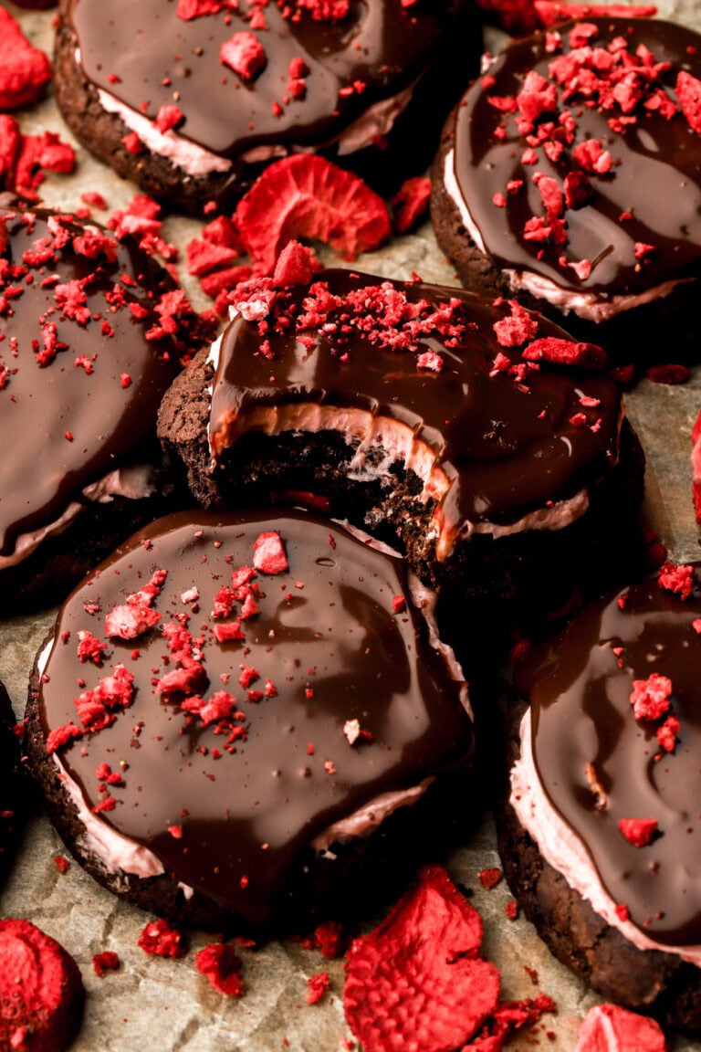 strawberry chocolate cookies with a bite taken out