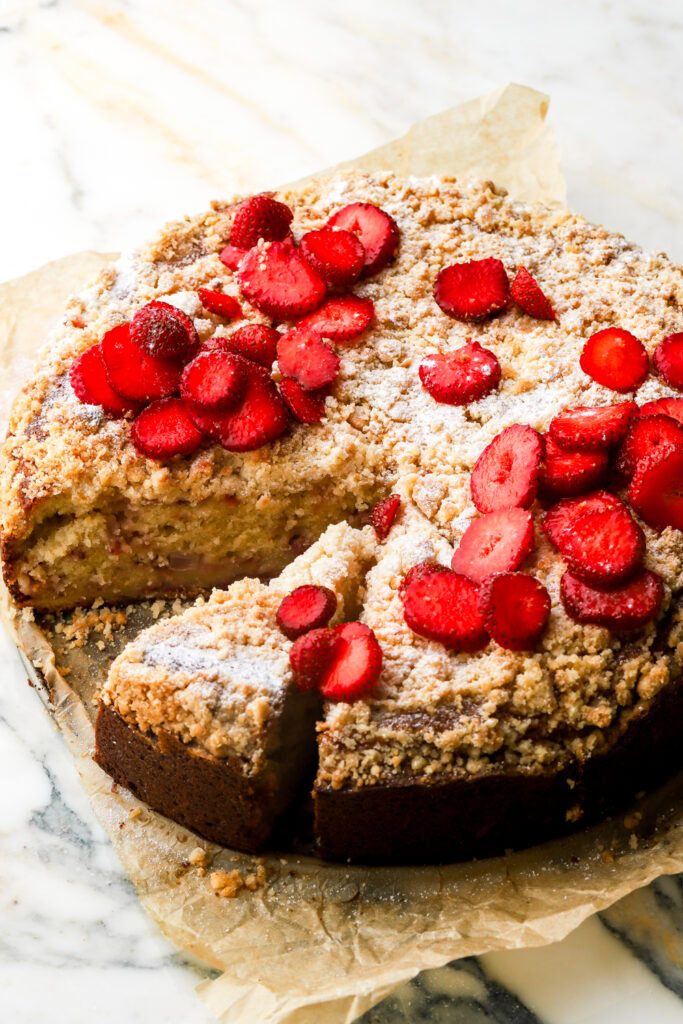 strawberry muffin cake topped with strawberry slices