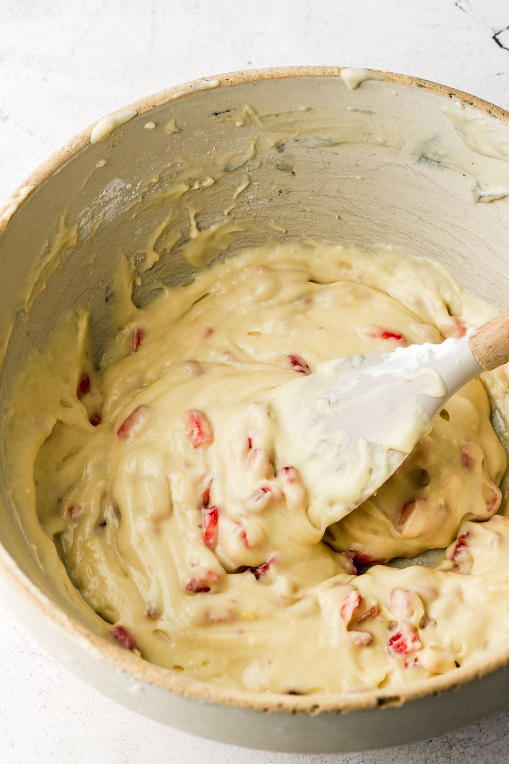 fold strawberries into batter