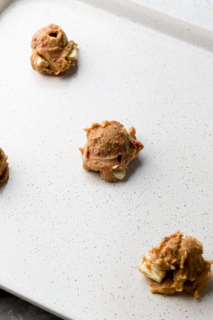 2 ounce cookies on a baking sheet